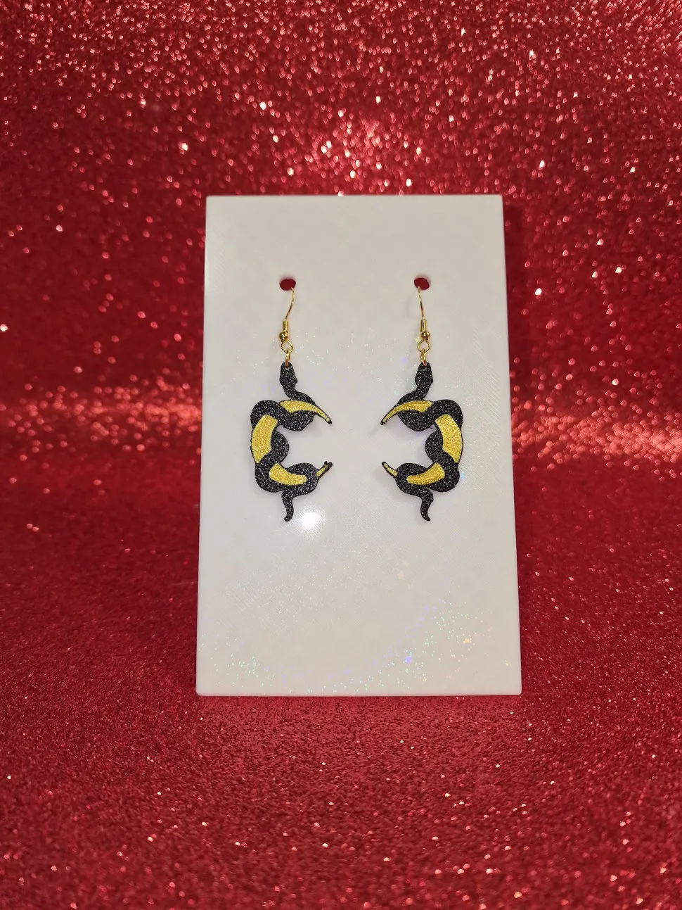 Serpent on the moon earrings view 2