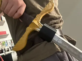 Belt clip sword holdster