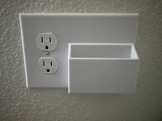 outlet cover with phone holder