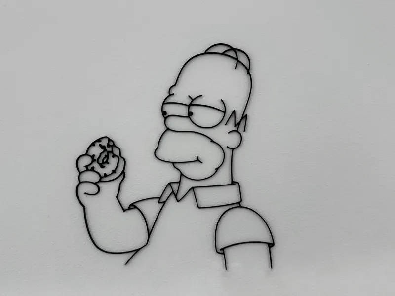 Homer Simpson eating a doughnut