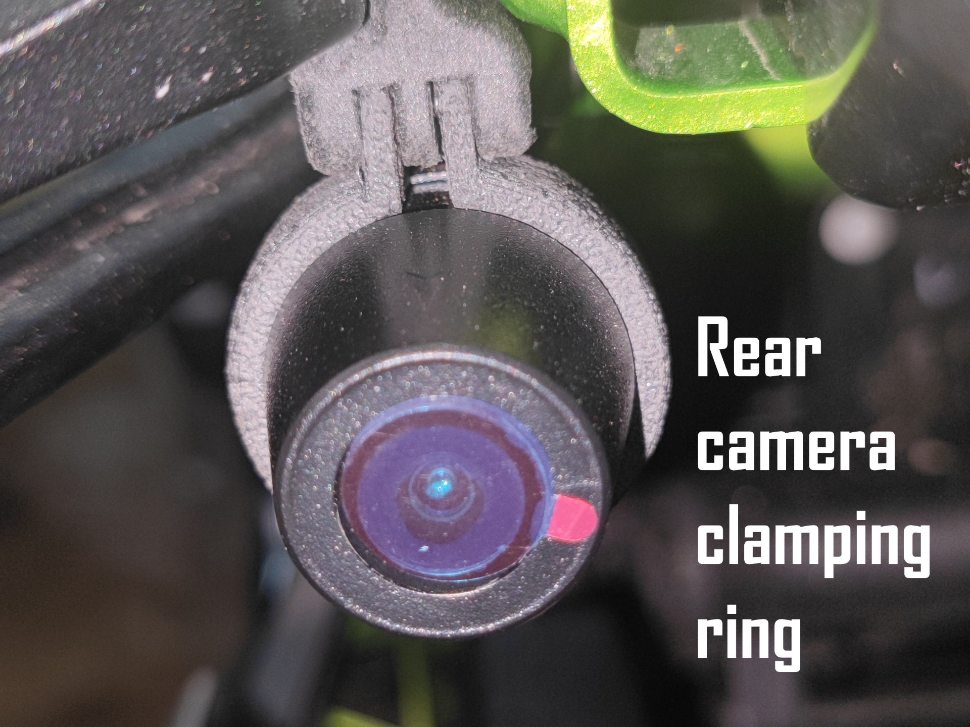 Rear camera clamping ring