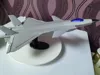 0.12mm layer height, 2 walls, 15% infill, approximately 350mm long, fully articulated, ultra-detailed assembly, retractable landing gear, with side magazine, multi-color