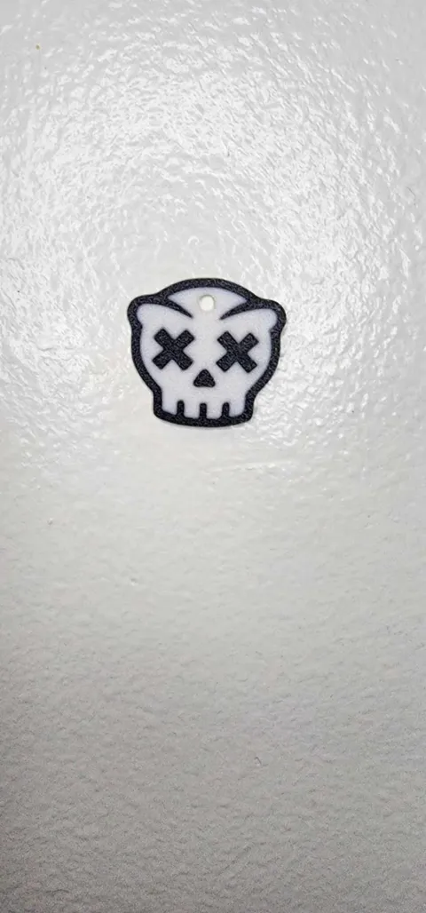 Skull earrings view 2
