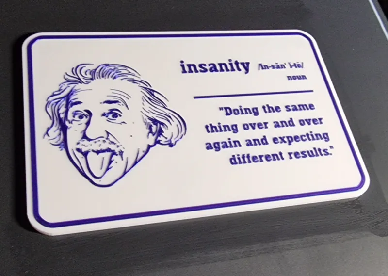 Sign "Definition of Insanity"