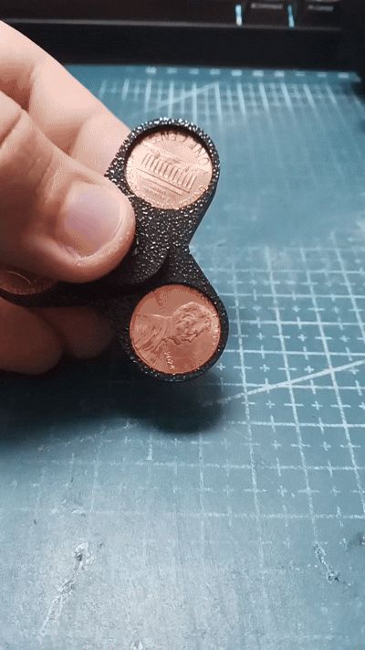 Tiny fidget spinner with one cent coins