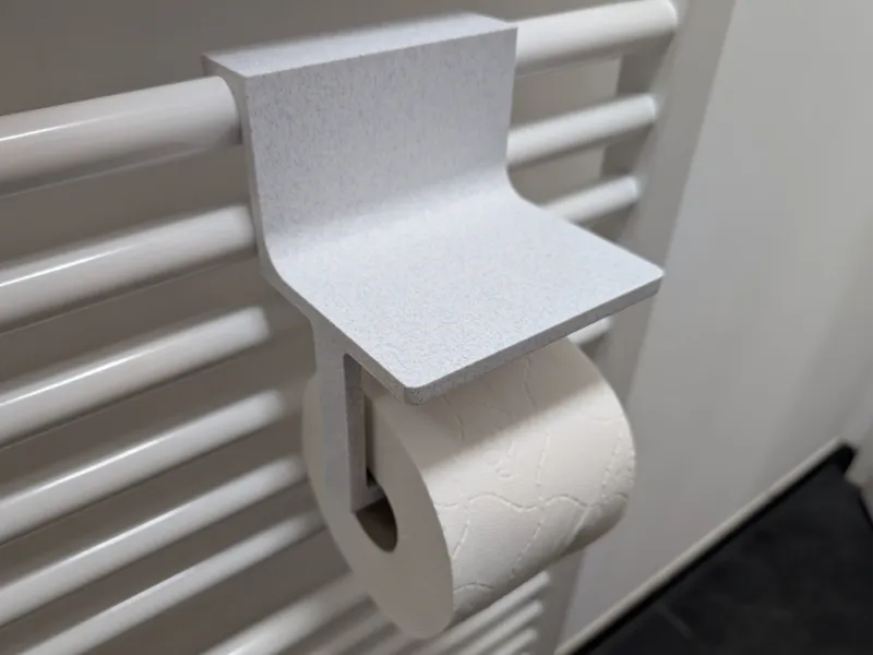 Heatbuddy - A Toilet paper holder for a bar heater