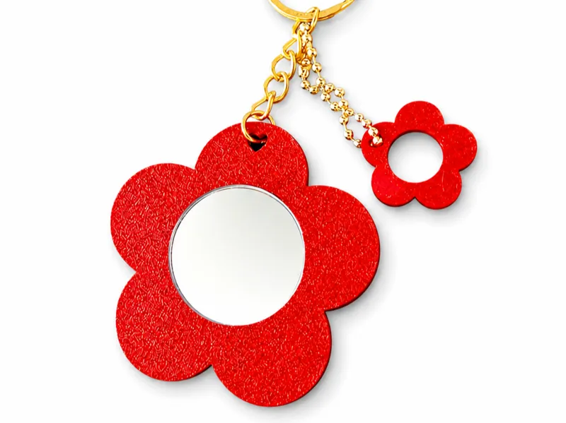 Chaveiro flor espelho com pingente