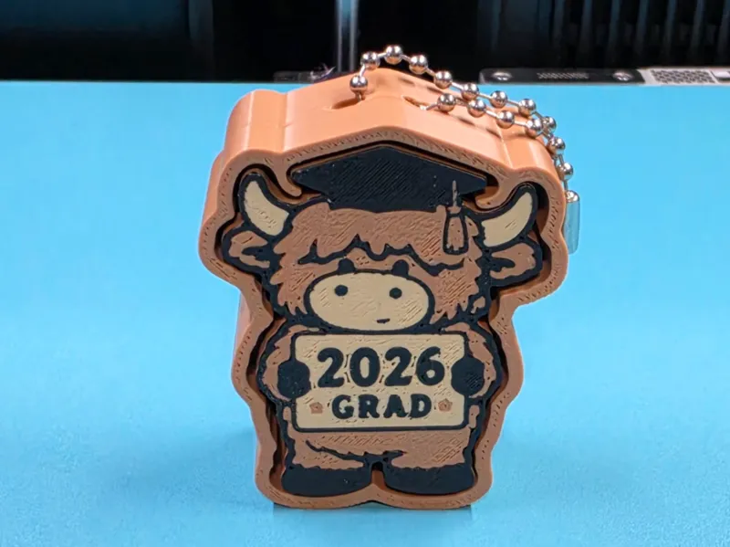 class of 2026 grad highland cow clicker keychain