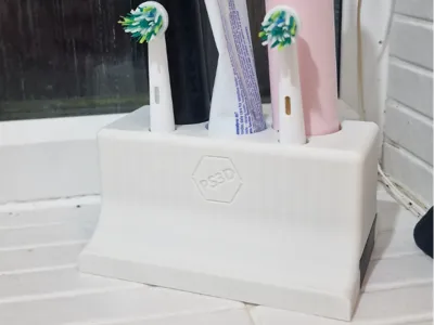 Toothbrush and toothpaste stand with drip tray 