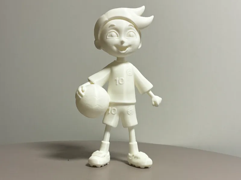 Toon soccer / football boy with ball