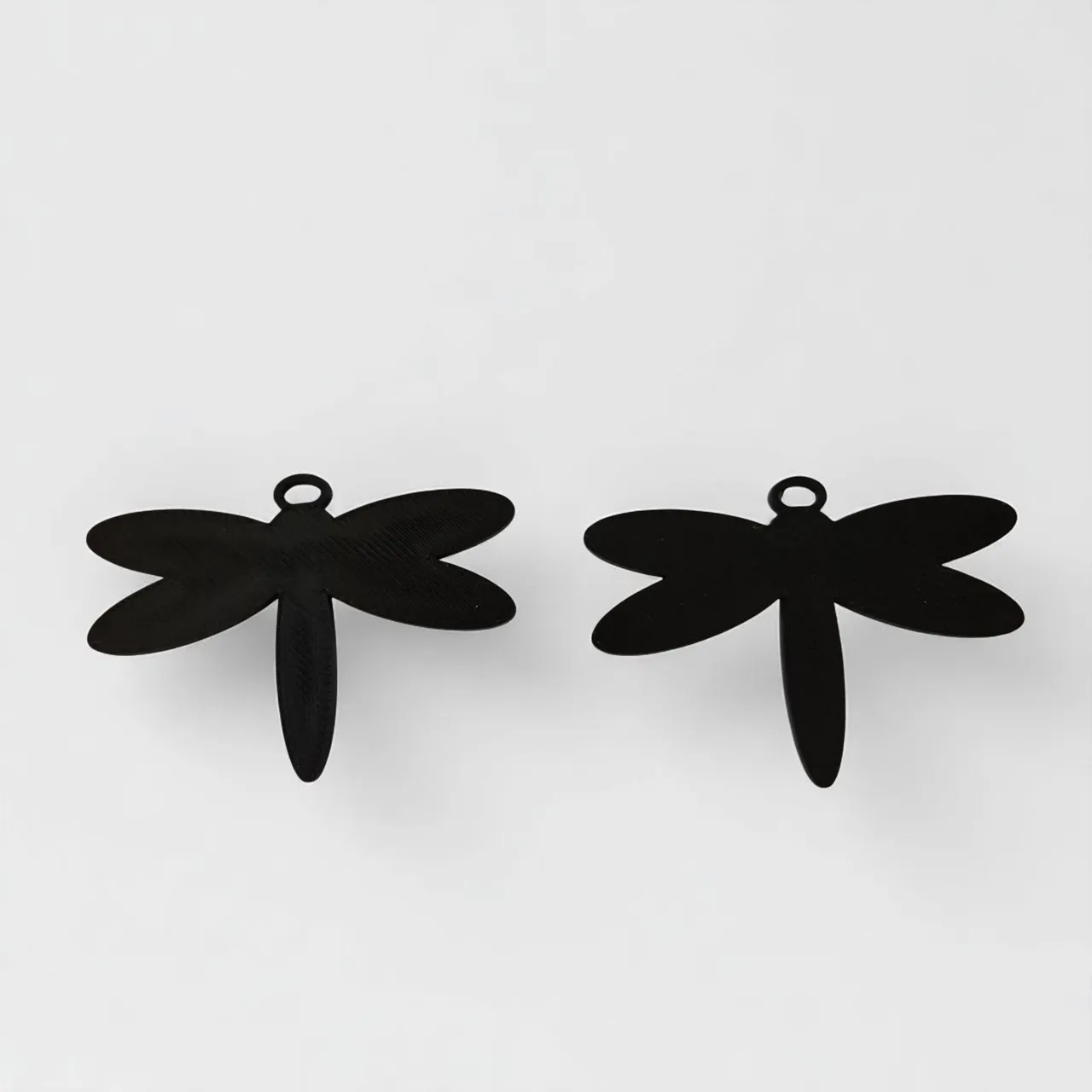 Libel shaped earrings view 2