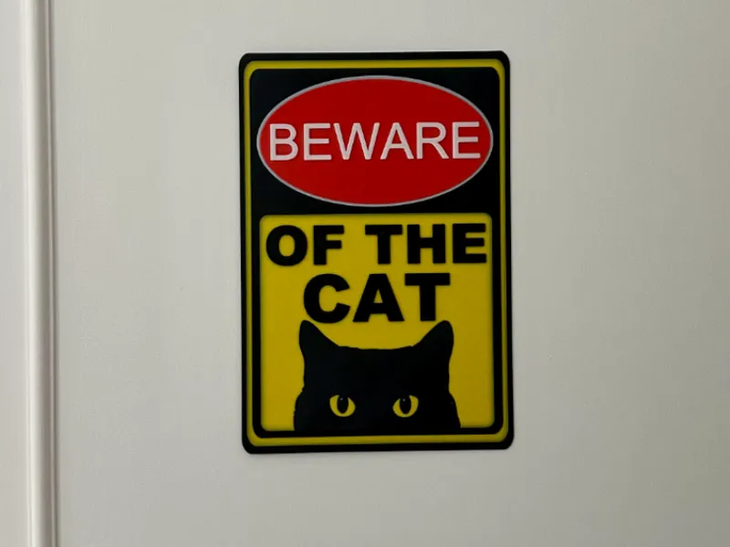 Warning Sign: 'BEWARE OF THE CAT'