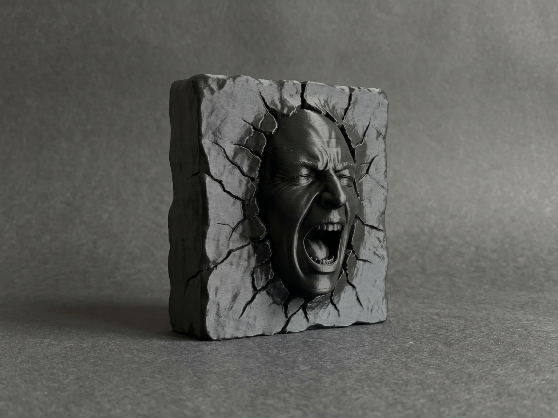 Emerging Face Sculpture (Cracked Stone Wall)