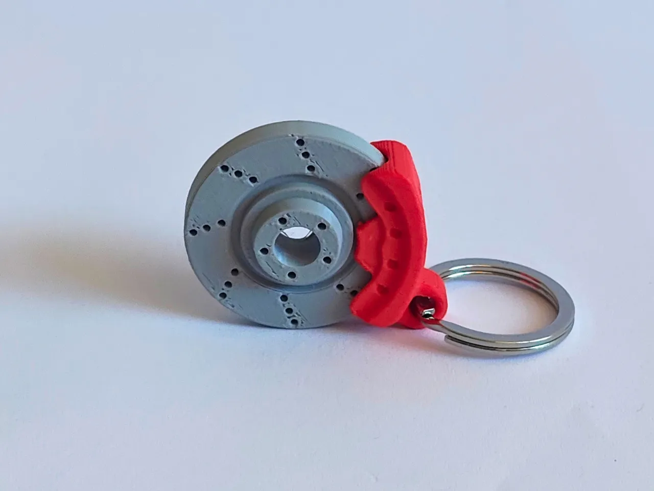 Rotating brake disc keychain view 3