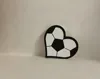0.2mm layer, 2 walls, 15% infill (4 holes, 4mm diameter, 2mm height)