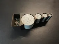 Holder and one-off's of large, medium, small and tiny bases