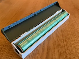 Low profile clingfilm holder