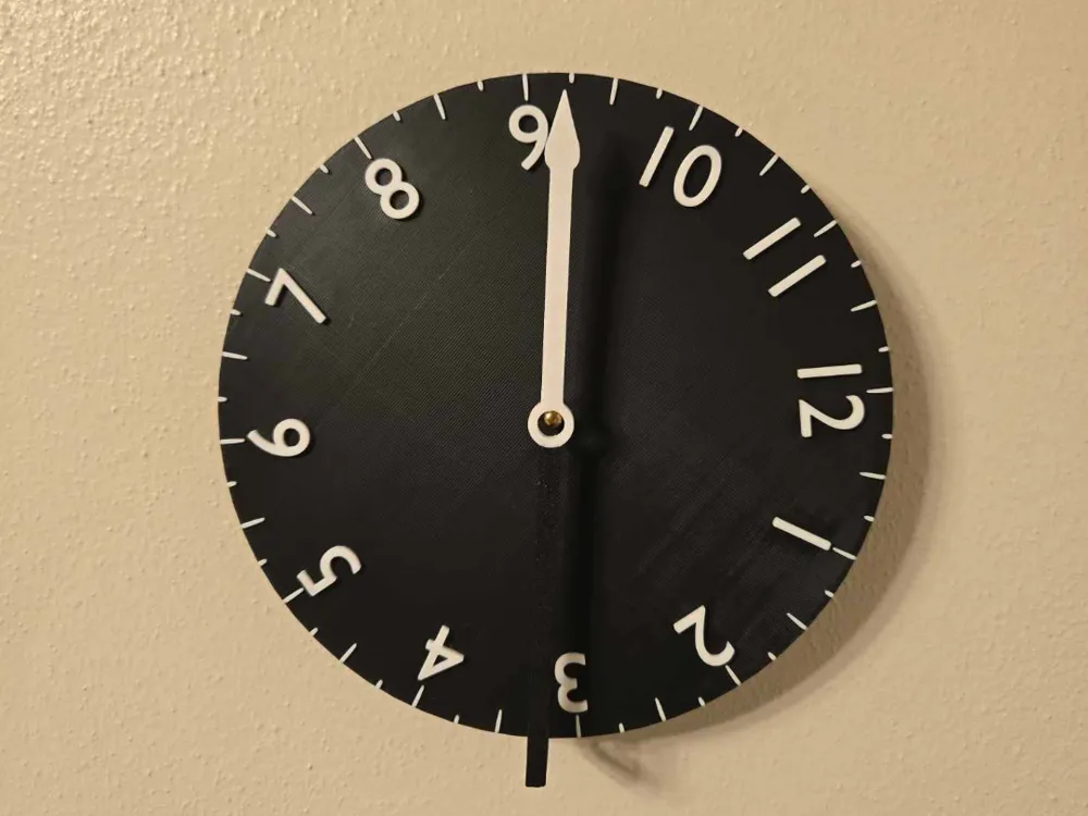 One hand rotating face clock by BlueWolfStitch - MakerWorld