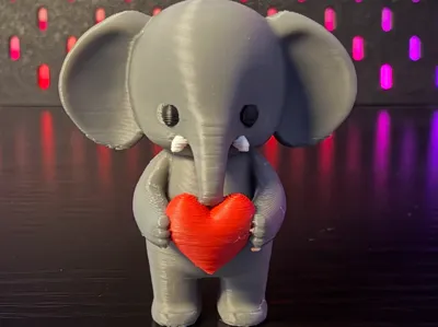 Cute Elephant Holding a Heart