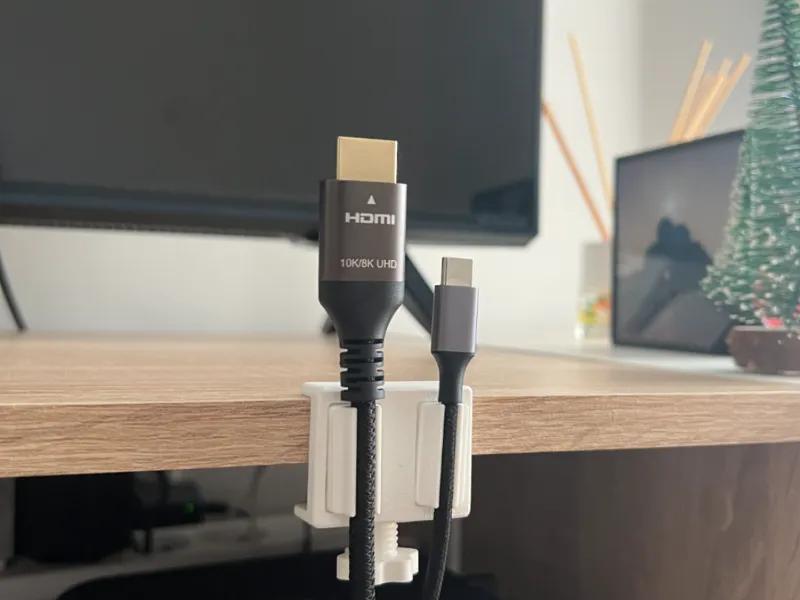 Magnetic desktop cable support