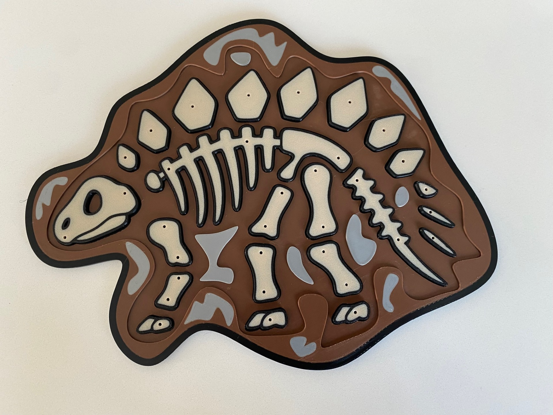 Stegosaurus dinosaur puzzle game