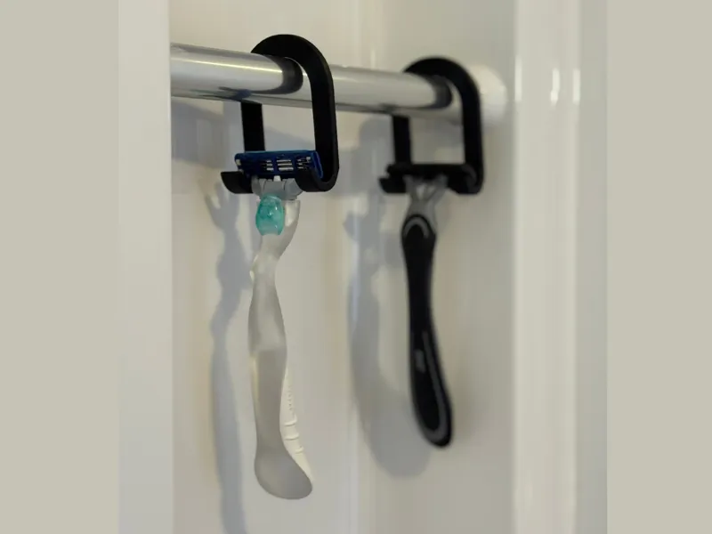 Support pour rasoir pour barre de douche