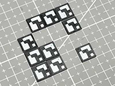 Textured build plate QR code