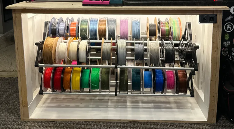 Rotating filament storage cabinet 