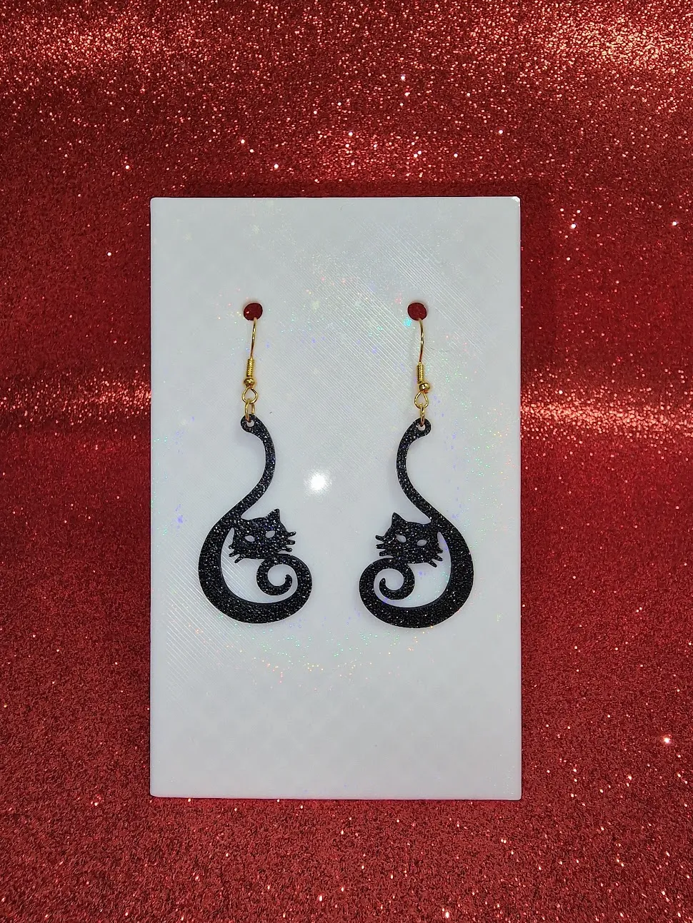 Cat in clef earrings view 2