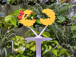 Pac-Man and Ms. Pac-Man cake stand topper