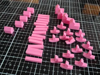 Catan pieces including boats