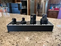 No Gridfinity base; scaled up to accommodate impact adapters