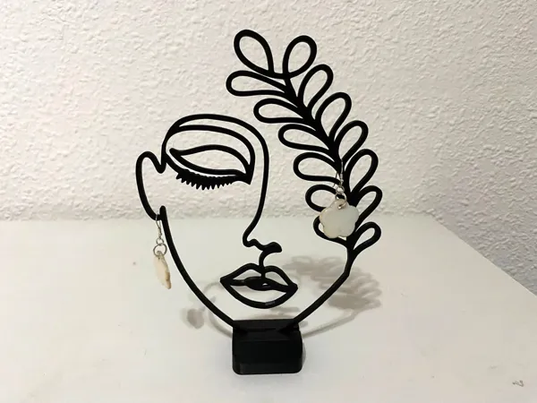 Présentoir visage minimaliste pour bijoux