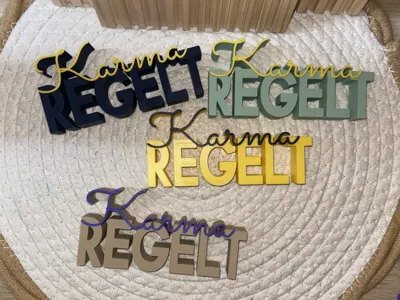 Lettering "Karma Rules"