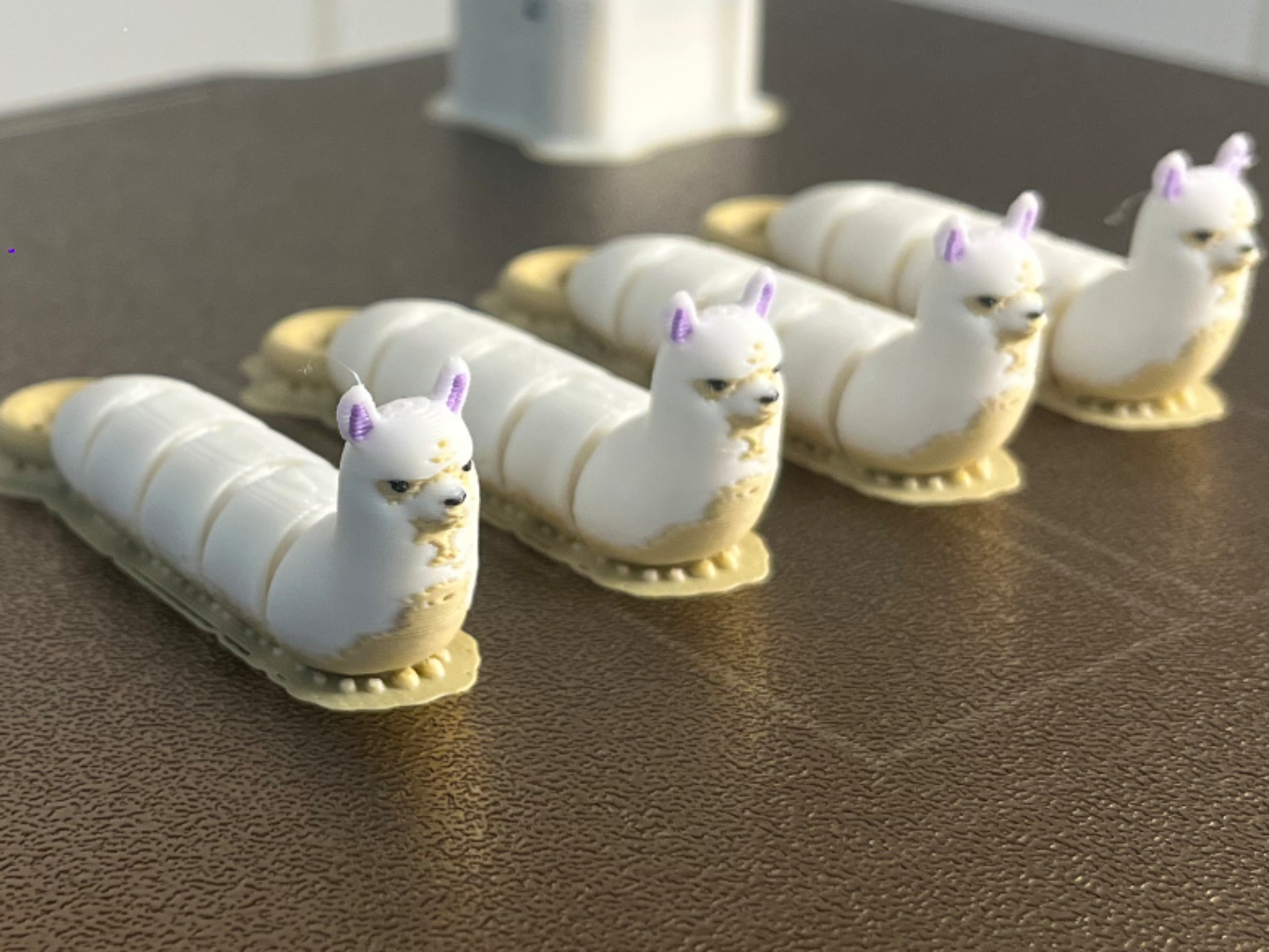 Larval Lama — Articulated Desk Companion