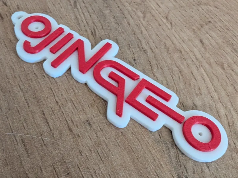 Squid game keychain - Customizable in OpenScad
