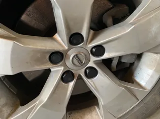 Parametric wheel nut cover and puller
