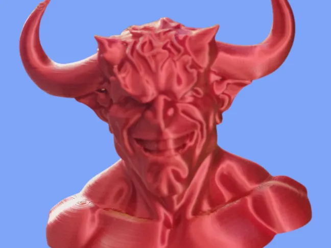 Bust of a smiling Devil.