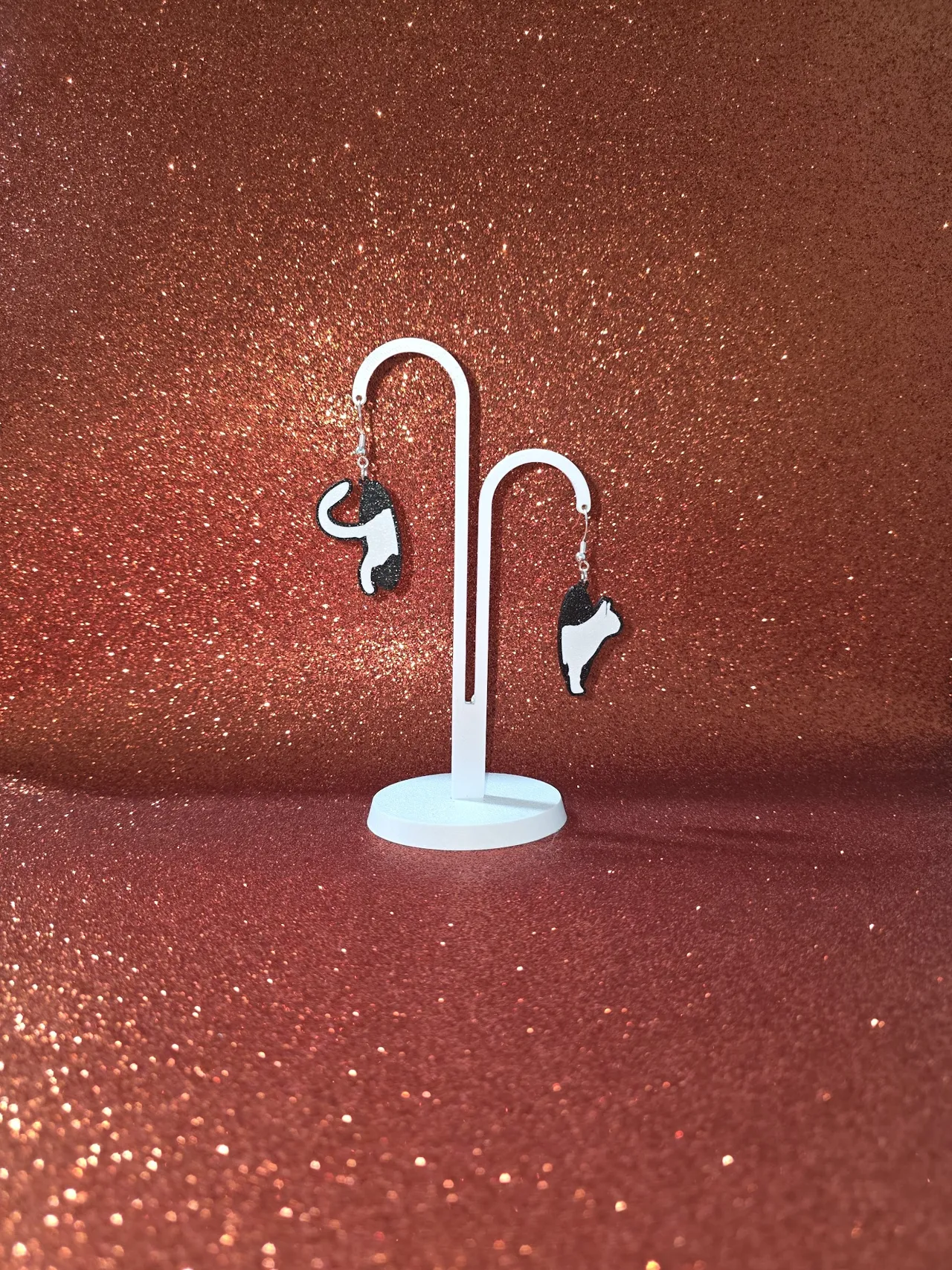 Cat in the hole earrings view 3
