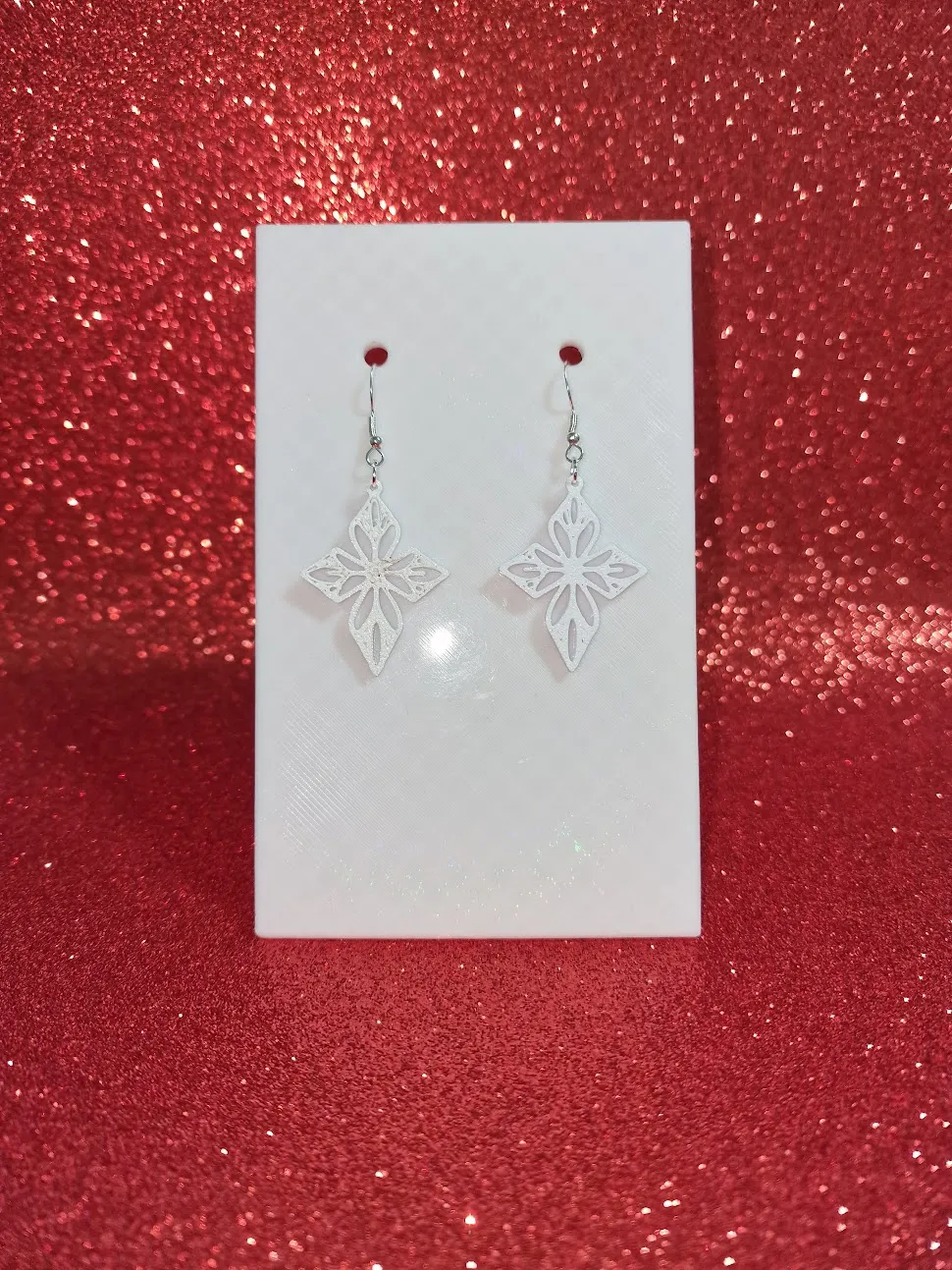 White cross earrings view 2