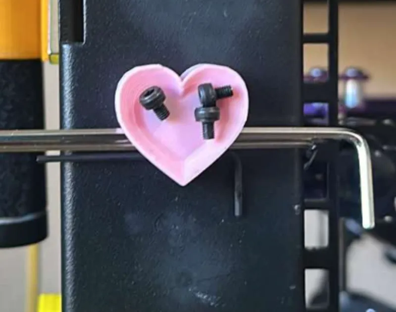 Heart shaped magnetic hex wrench and screw holder