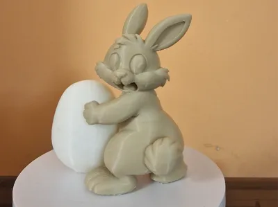 Surprised bunny with an egg