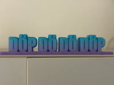 Decorative display item "Döp Dö Dö Döp"