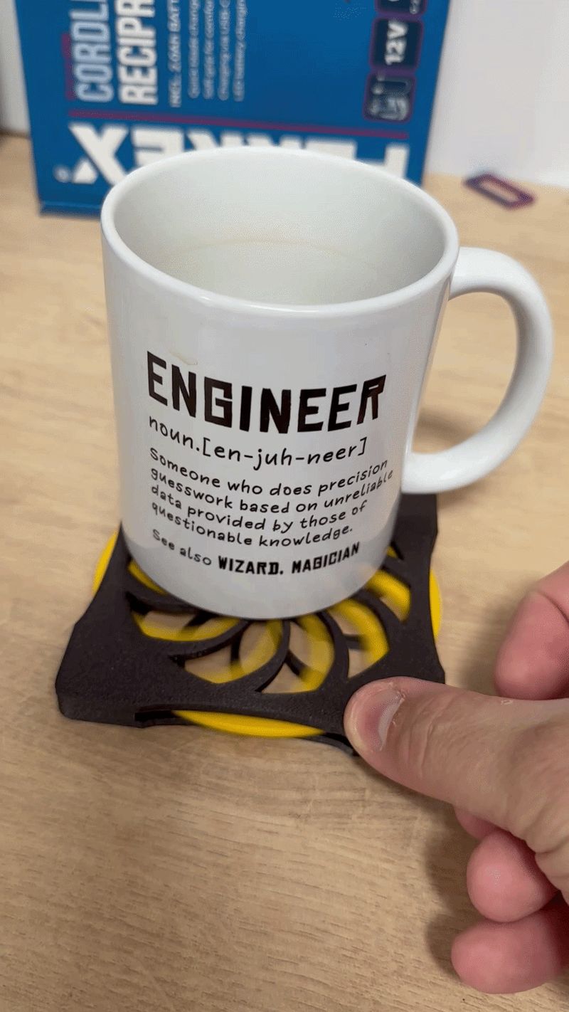 Kinetic coaster, spinning fidget coaster