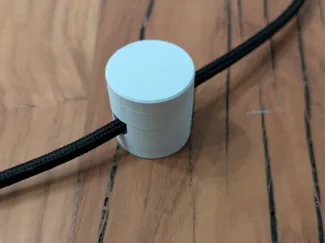 Cord support for wall and ceiling