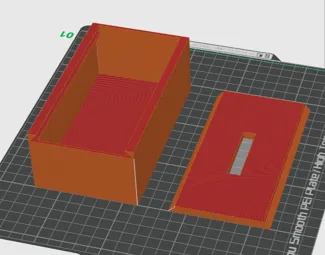 Box with sliding lid and hole