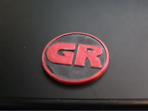 GR coin from Pokemon Card Game GB2