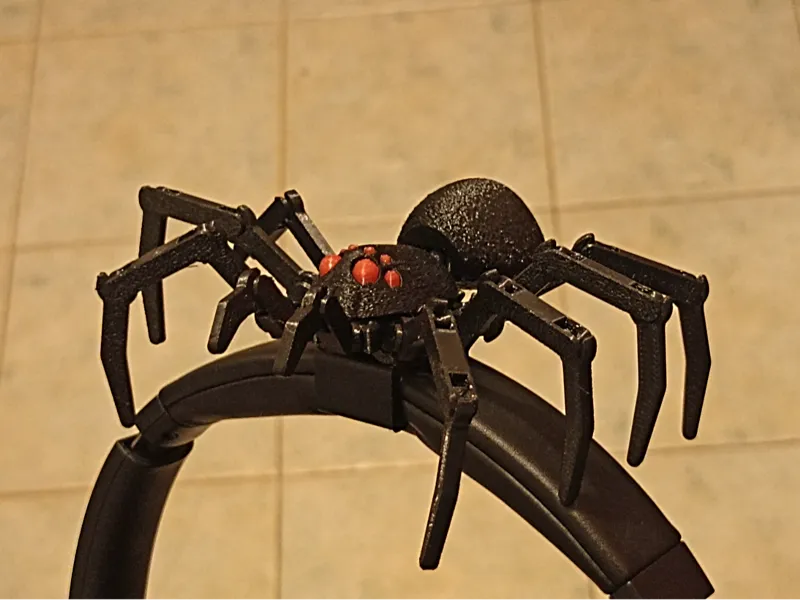 Headset clip for articulated spider