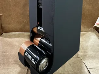 D-type battery holder/dispenser