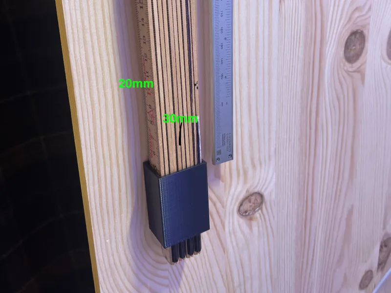 Folding rule wall holder